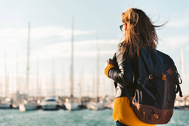 istock A Beautiful woman spending time on the beach 1186775856