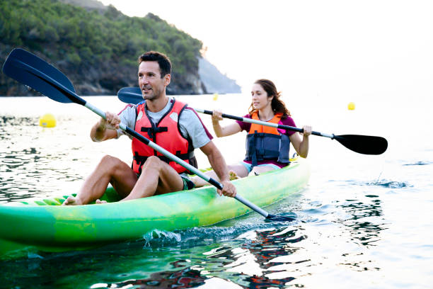 istock Smiling kayakers enjoying morning paddle off the Costa Brava 1186776763