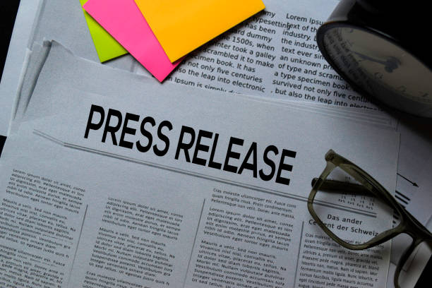 istock Press Release text in headline isolated on office desk. Newspaper concept 1186776924