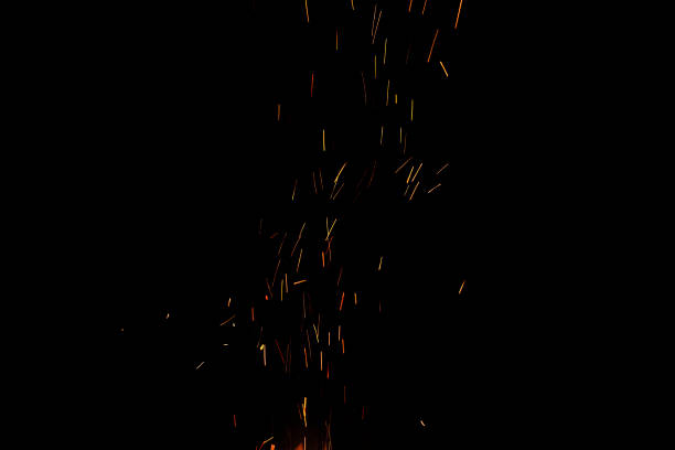 istock bonfire spark in the dark sky in night, shallow focus 1186782125