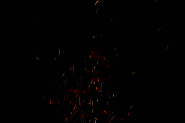 istock bonfire spark in the dark sky in night, shallow focus 1186782129