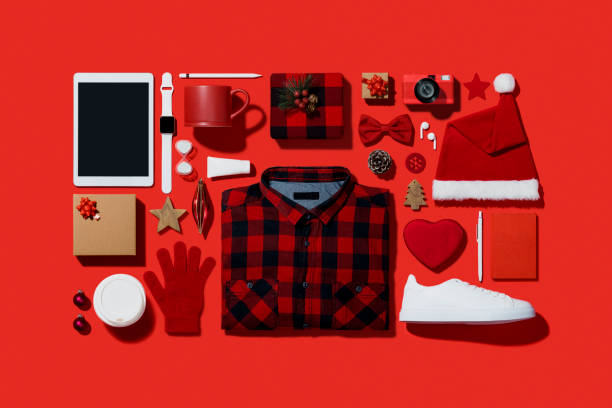 istock Christmas shopping flat lay on red background 1186785253