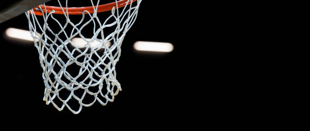 istock Basketball hoop isolated on black background 1186789528