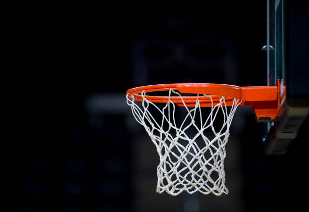 istock Basketball hoop isolated on black background 1186789529