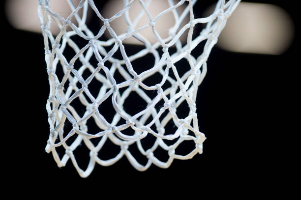 istock Empty Swooshing Basketball Net Close Up with Dark Background 1186790088