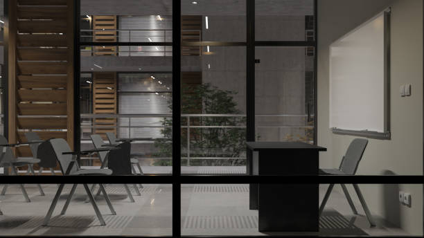 istock Behind the Windows of an Illuminated Seminar Room Inside a Multi Story Building 1186793427