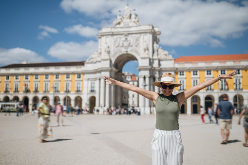 Young woman enjoying beautiful Lisbon day