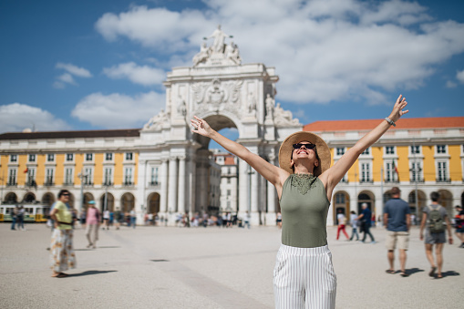 Young woman enjoying beautiful Lisbon day