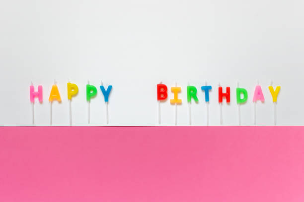 istock Happy Birthday greeting card with letters candles 1186797298