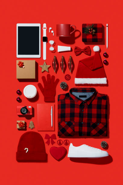 istock Christmas shopping flat lay on red background 1186798424
