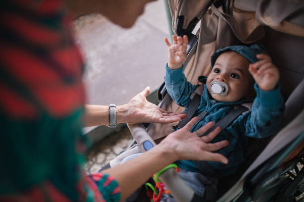 istock Baby boy reaching for his mommy 1186798487
