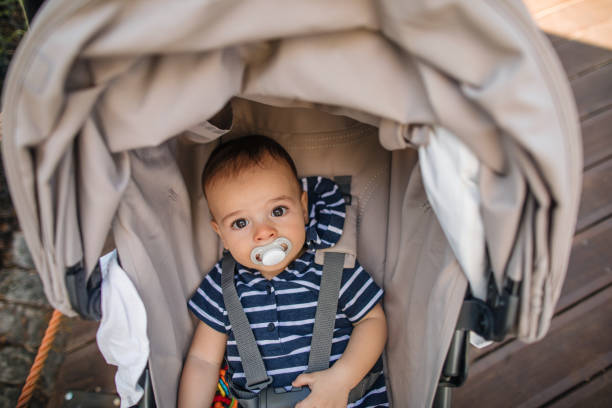 istock Dissatisfied and tired baby boy 1186801144