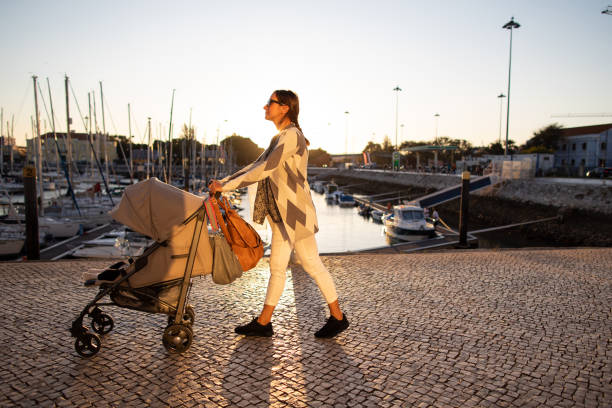 istock Mother in son un relaxing sunset walk 1186803410