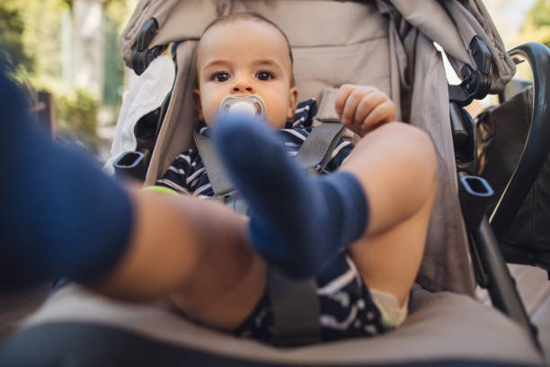 istock Baby boy trying to kick camera 1186803556