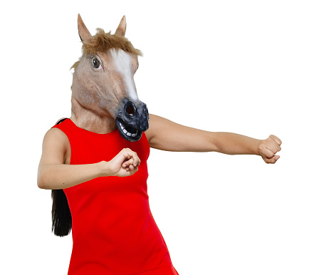 Front view / one person / waist up / portrait of 20-29 years old adult beautiful black hair / long hair latin american and hispanic ethnicity female / young women standing / dancing / exercising wearing mask - disguise / costume / horse costume / dress who is smiling / happy / cheerful / laughing / joy / humor / bizarre / cool attitude / horse