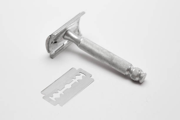 istock Vintage razor blade on a white background 1186815171