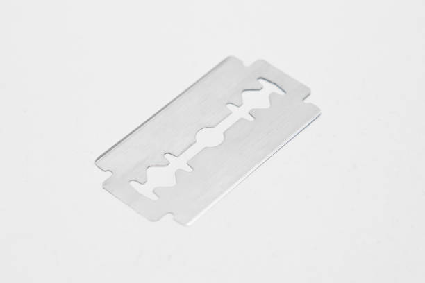 istock Vintage razor blade on a white background 1186815176