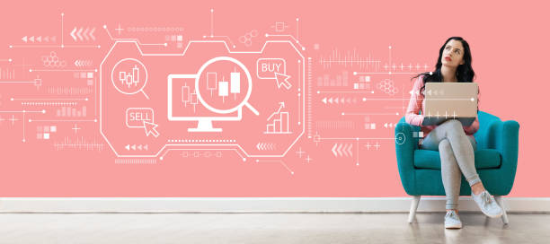 istock Stock trading concept with woman using a laptop 1186816562