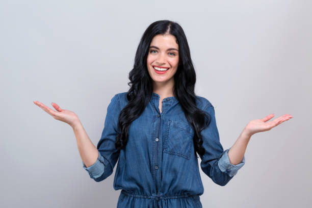 istock Young woman with displaying hand gesture 1186816636