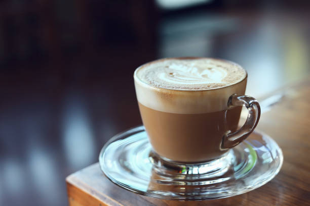 istock hot latte coffee put on wooden table in cafe restaurant 1186825333