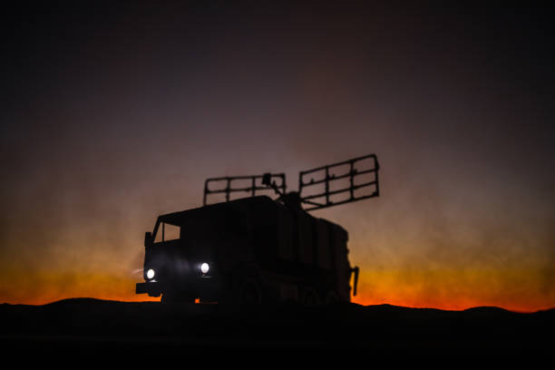 istock Satellite dishes or radio antennas against evening sky. Selective focus 1186826445