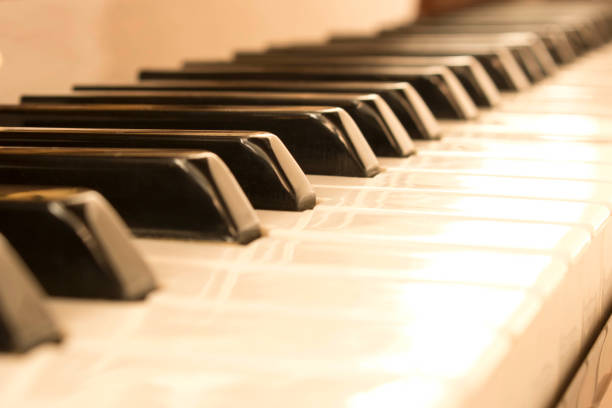 istock Piano keys. Piano keys background. Selective focus. 1186826552