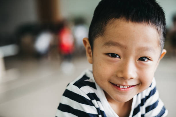 Smiling Asian boy Smiling Asian boy korean baby stock pictures, royalty-free photos & images