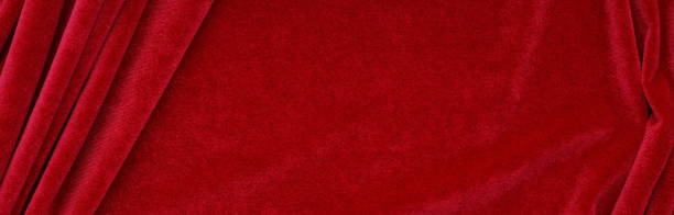 istock velvet texture red color background banner, expensive luxury fabric,  wallpaper. Christmas backdrop. copy space 1186830302