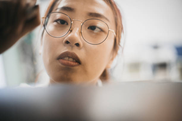 istock Beautiful young Asian girl confidently drawing 1186830490