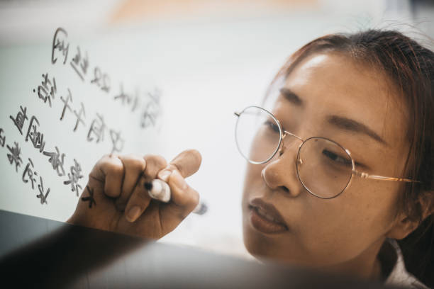 istock Business woman writing 1186830864