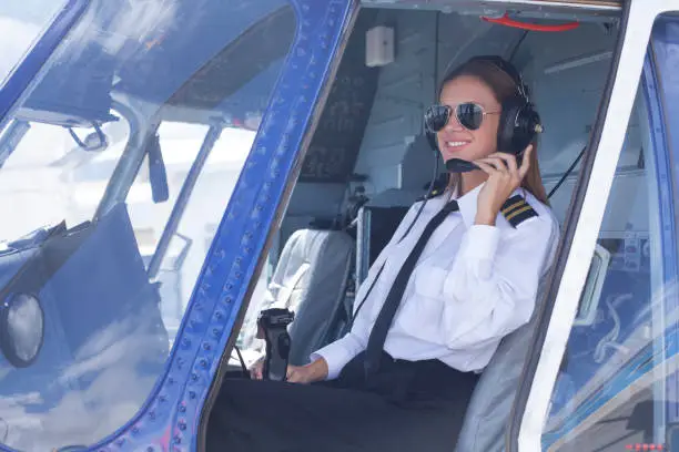Photo of Helicopter pilot woman ready to make the flight
