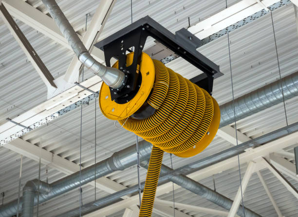 istock Drum with a hose for exhaust gas in a service station 1186833140