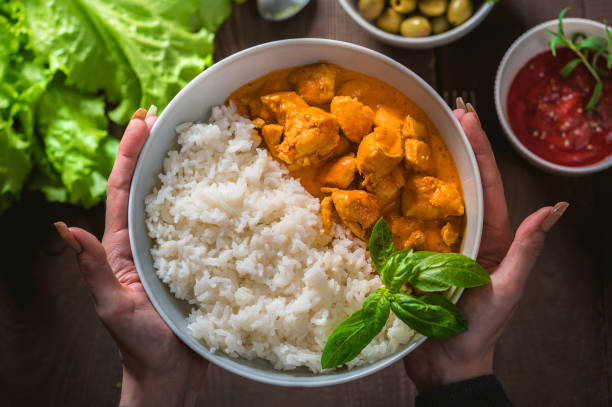 istock Indian curry chicken with basmati rice in bowl 1186843315