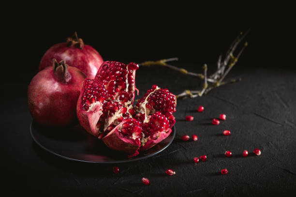 istock Ripe pomegranate fruits 1186844184