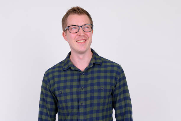 istock Young happy hipster man thinking and looking up 1186845554