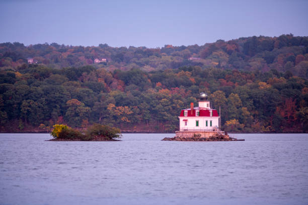 istock Port Ewan Lighthouse Flashes Bright in the Hudson River New York State 1186848363