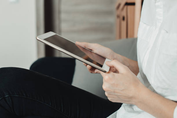 istock A picture of a young woman working on a tablet computer 1186852096