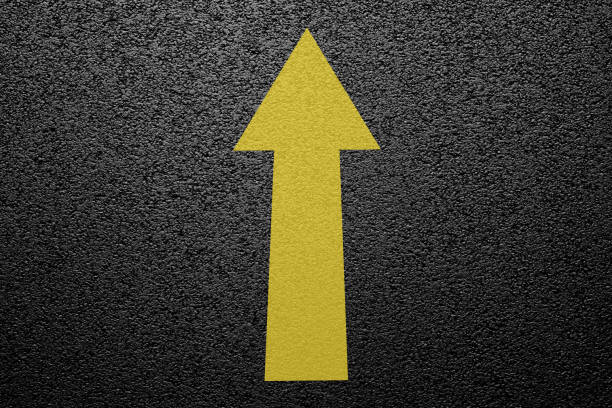 Straight forward sign on asphalt