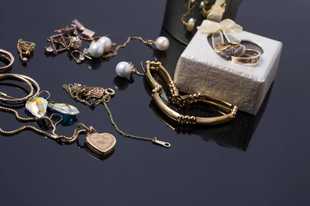 istock Various old jewelry on a black background. 1186858420