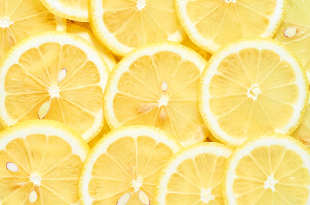 istock background of heap fresh yellow lemon slices. pattern for your design 1186859296