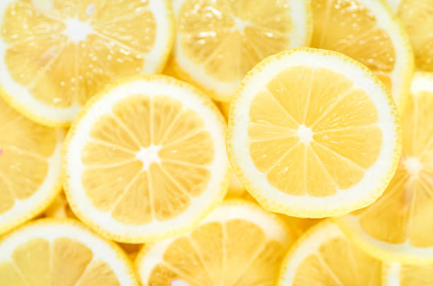 istock background of heap fresh yellow lemon slices. pattern for your design 1186859812