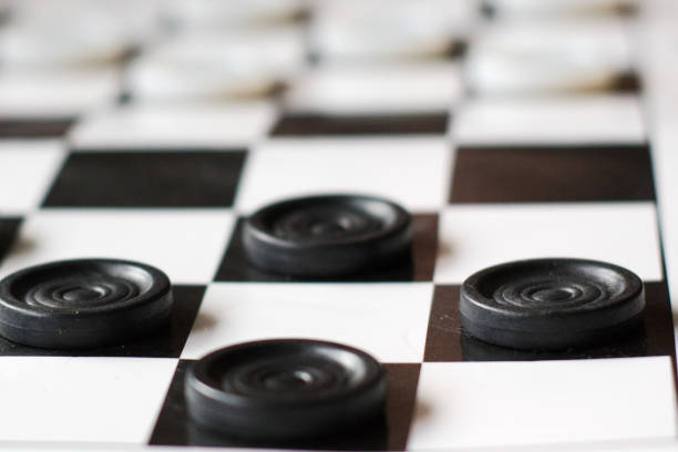 istock Checkers artboard. Blacks and whites ready to start the new game. 1186862860