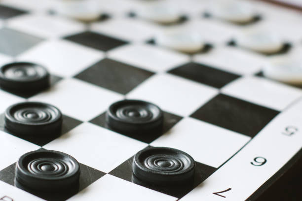 istock Checkers artboard. Blacks and whites ready to start the new game. 1186862977