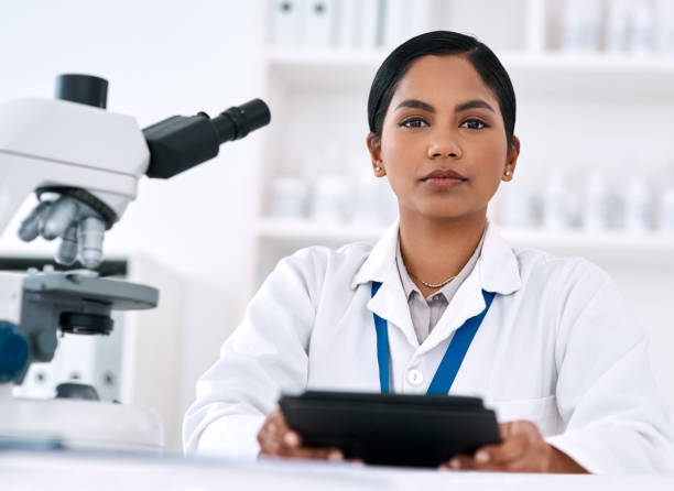 istock I use my tablet to record all my results 1186867478