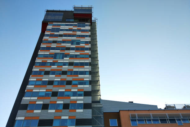 istock Low angle view of high multistorey office building. 1186869475