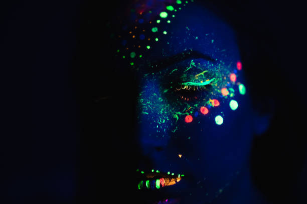 istock Woman with fluorescent makeup 1186871522