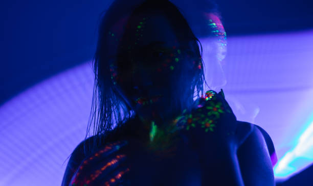 istock Woman with fluorescent makeup 1186871922