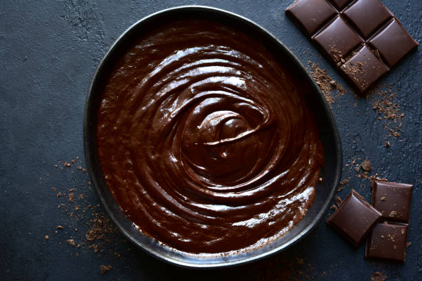 istock Homemade chocolate ganache in a black bowl 1186875273