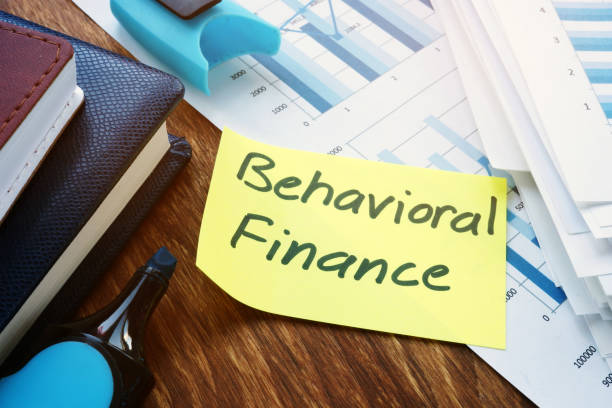 istock Behavioral Finance concept. Stack of business documents and marker. 1186875474