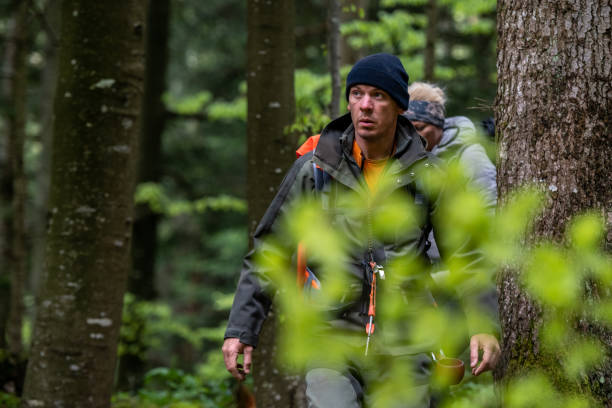 istock Couple hiking in forest 1186880985